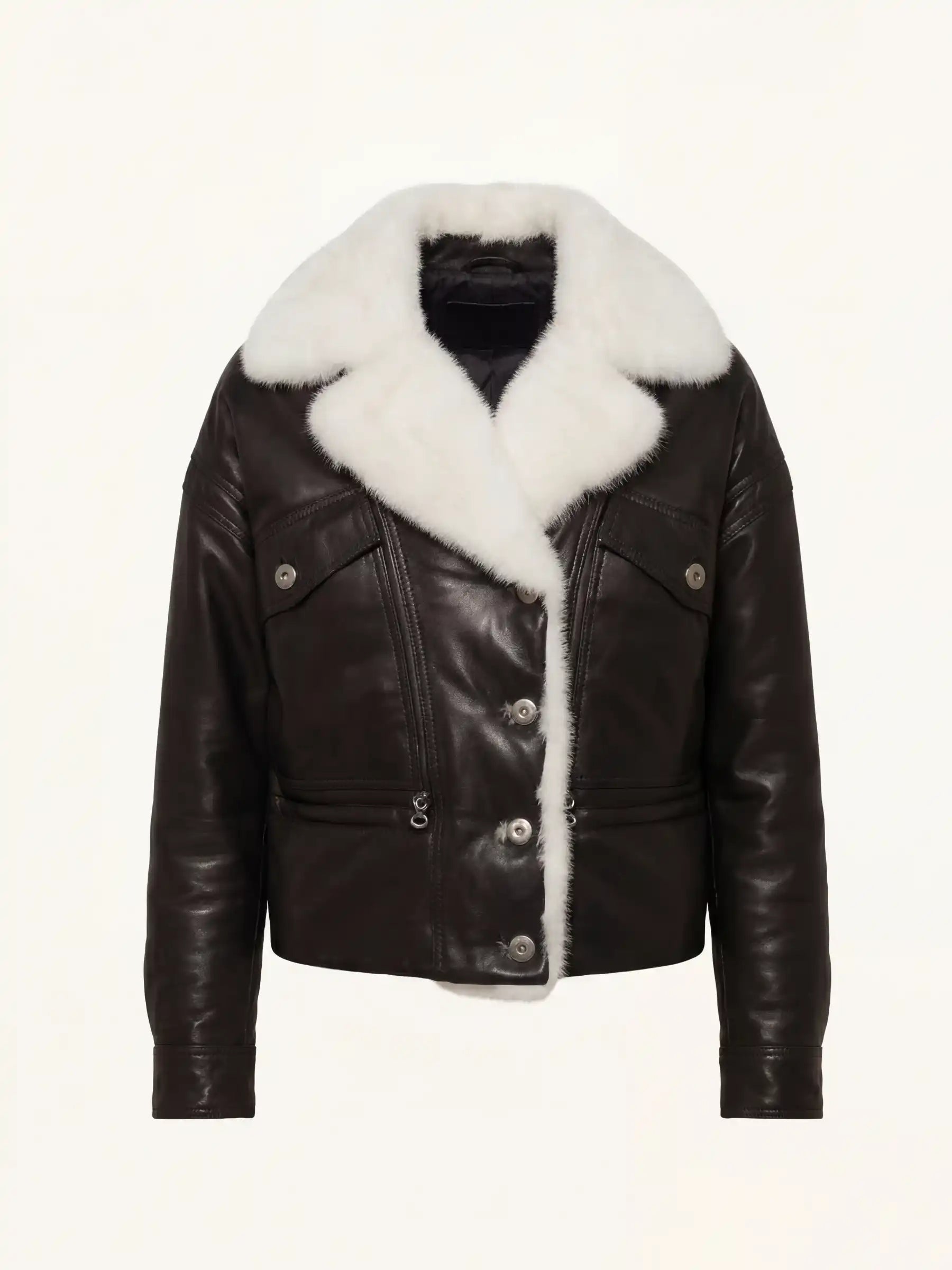 Black leather jacket with white fur collar on a beige background