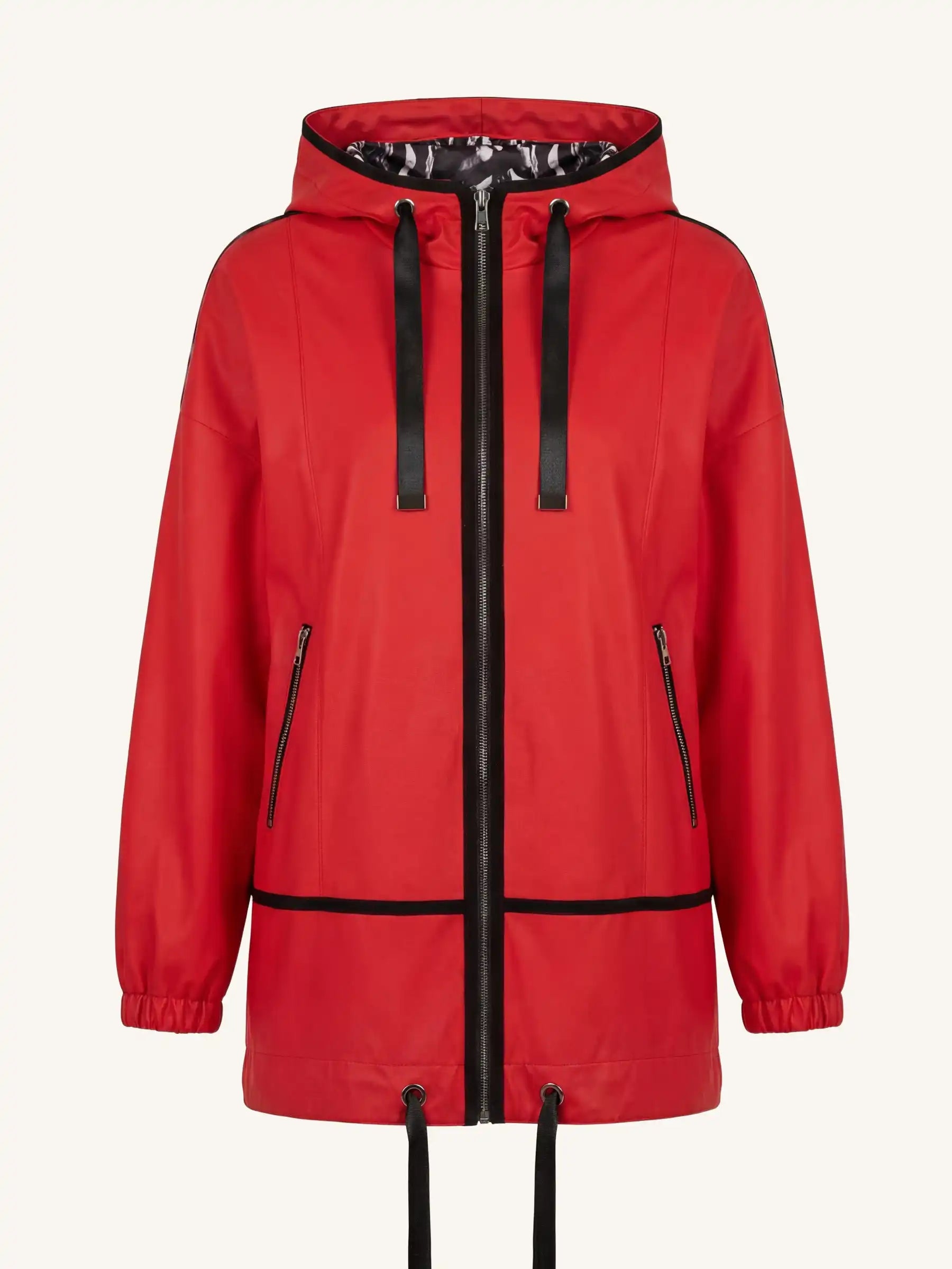 Red leather coat with black zipper and trim on a white background