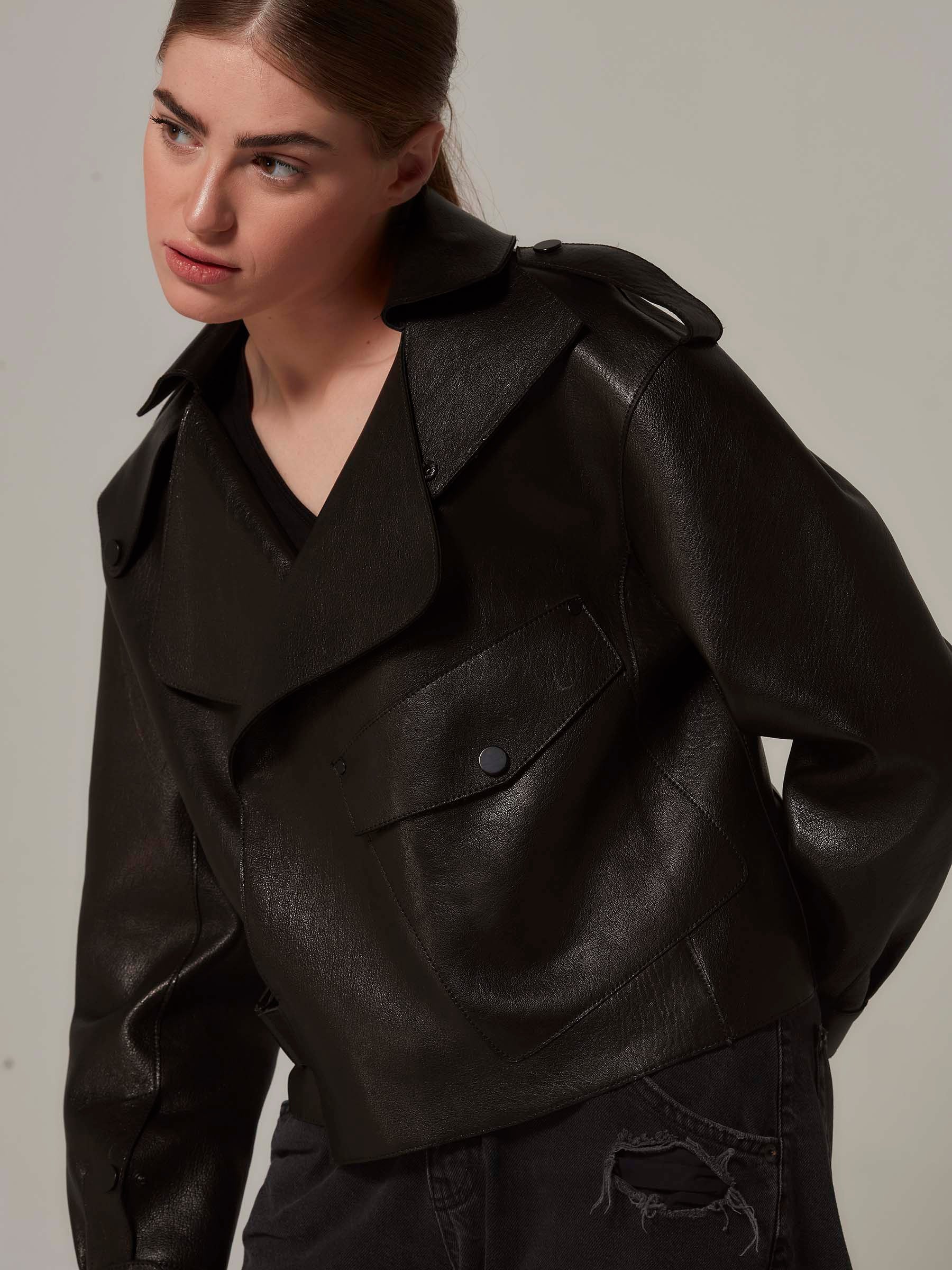 Black Oversized Leather Motorcycle Jacket - Minimalist Design front close up pose