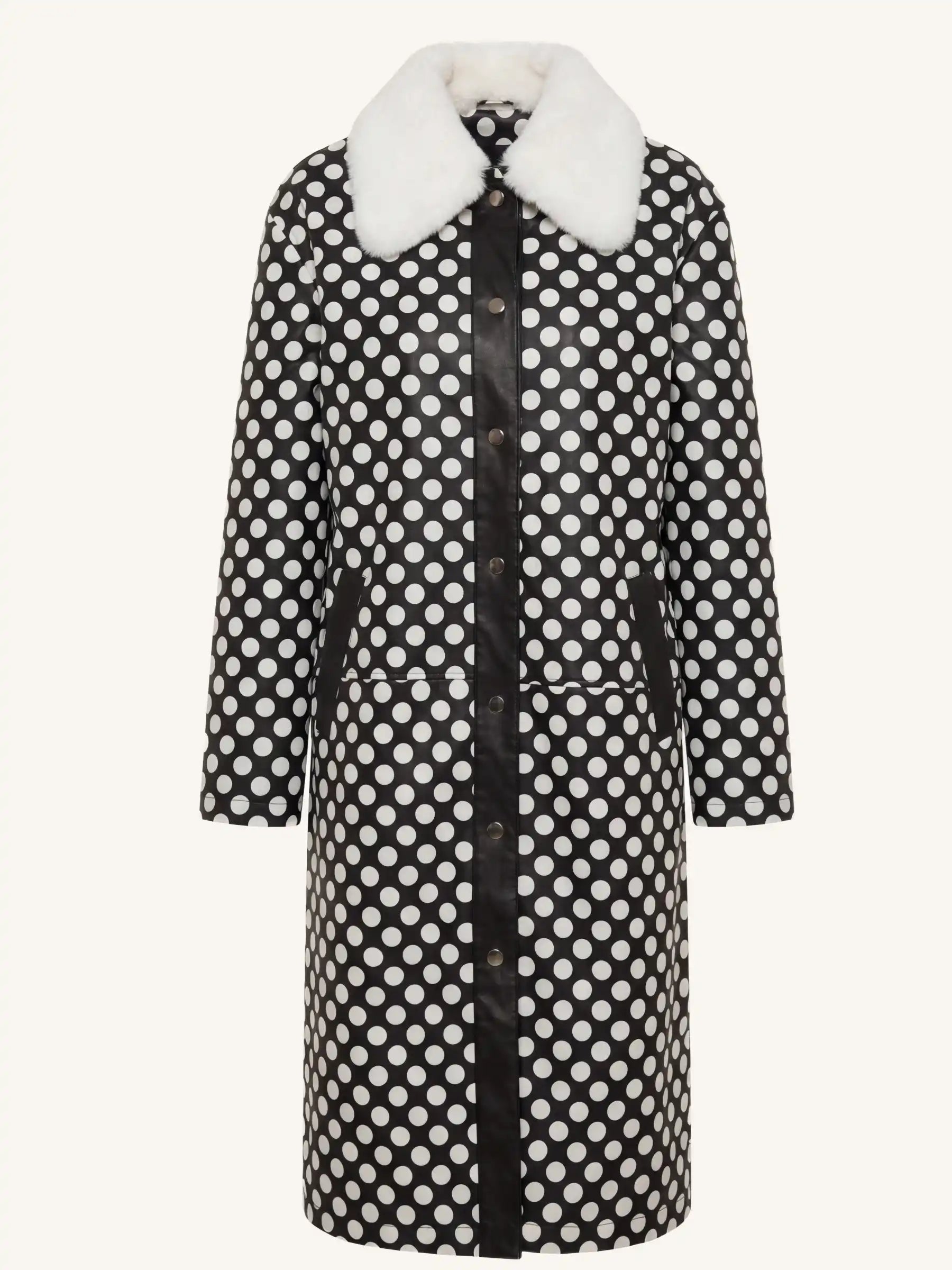 Black and white polka dot coat with white fur collar on a white background