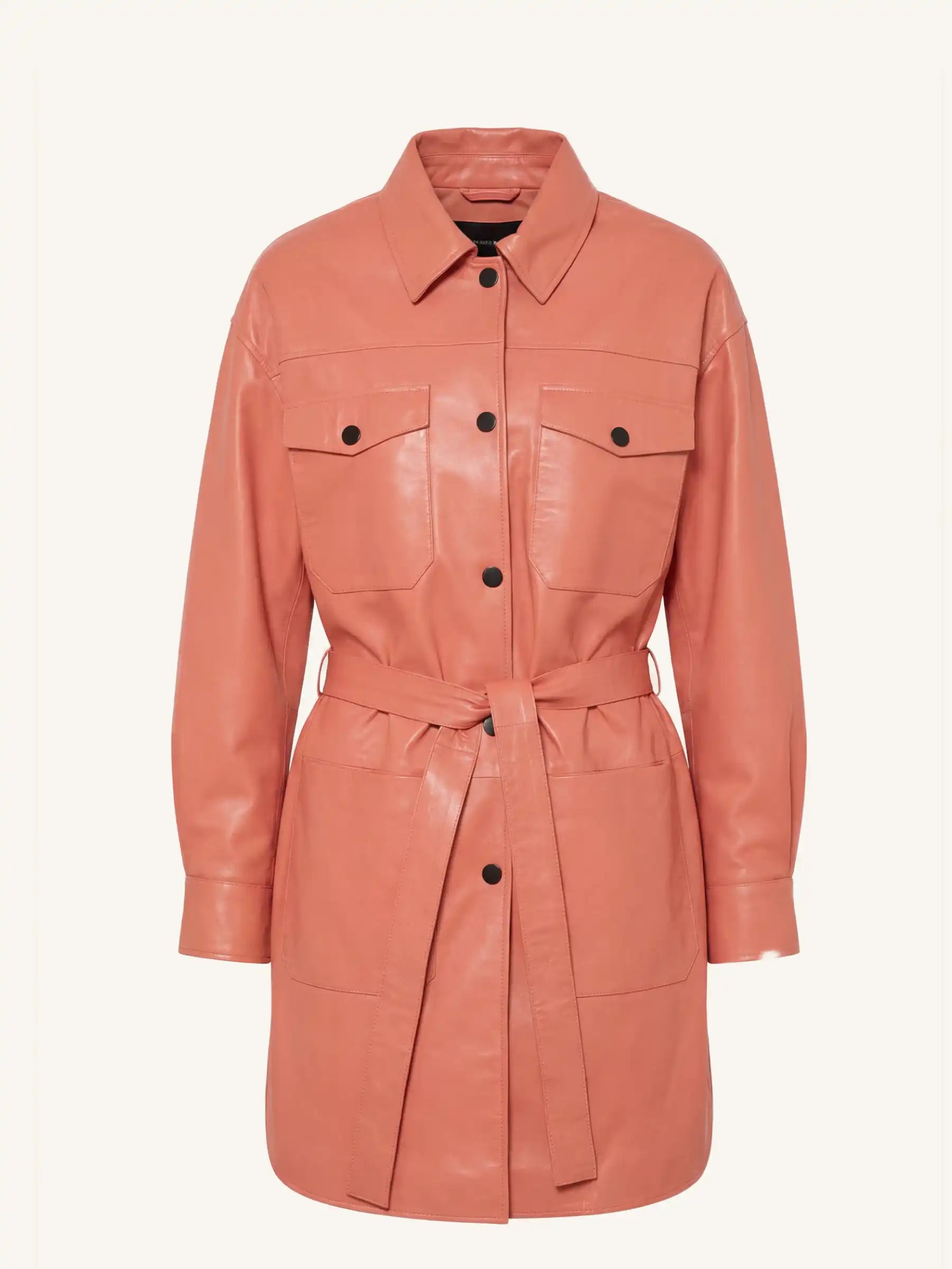 orange leather trench coat with black buttons on a white background